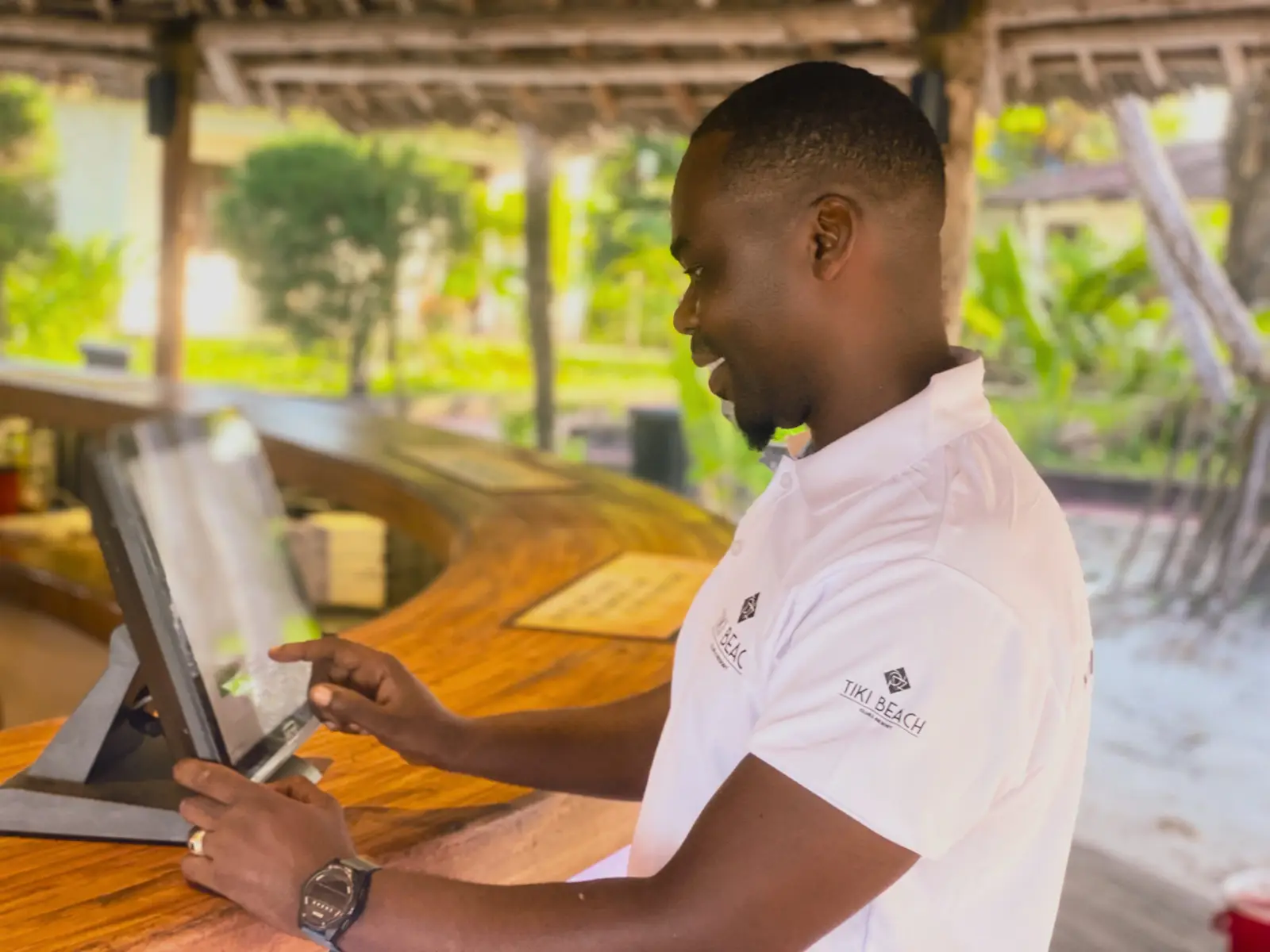 Tiki Beach team member preparing the bar